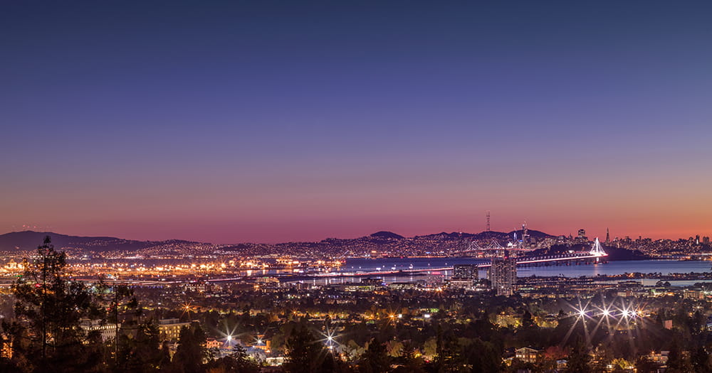 A picturesque view of Alameda's unique blend of urban charm and natural beauty, highlighting Pedro's Moving Services team meticulously packing and moving belongings with Alameda's iconic landscapes in the background, symbolizing a seamless transition to your new home in the Bay Area.