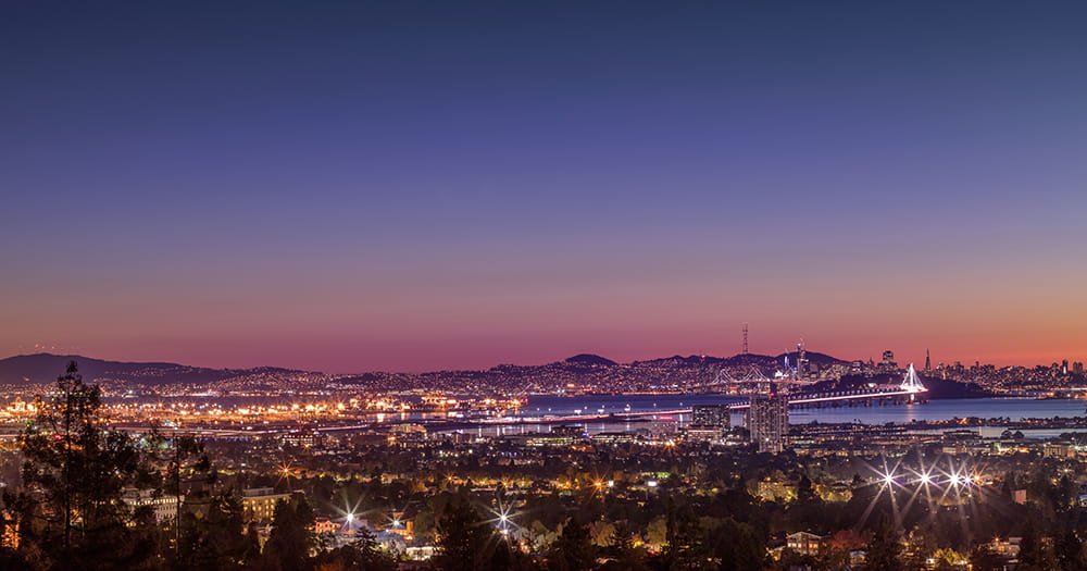 A picturesque view of Alameda's unique blend of urban charm and natural beauty, highlighting Pedro's Moving Services team meticulously packing and moving belongings with Alameda's iconic landscapes in the background, symbolizing a seamless transition to your new home in the Bay Area.